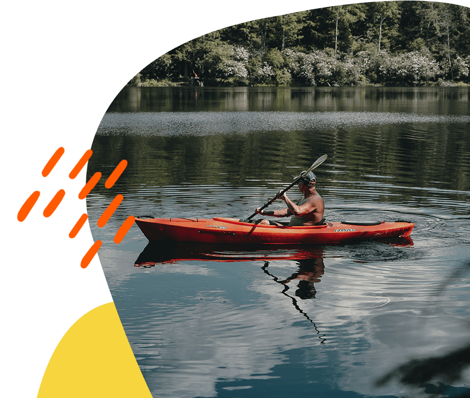 A person kayaking on the lake